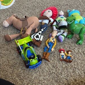 collection of Disney/Pixar Toy Story action figures and toys,